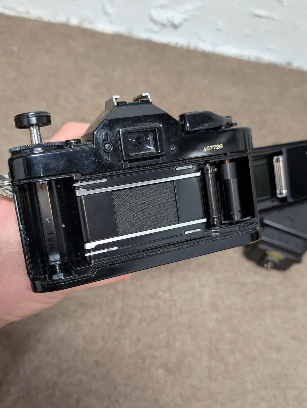 Vintage Canon A-1 Black SLR Camera with Black Lens and Black Flash